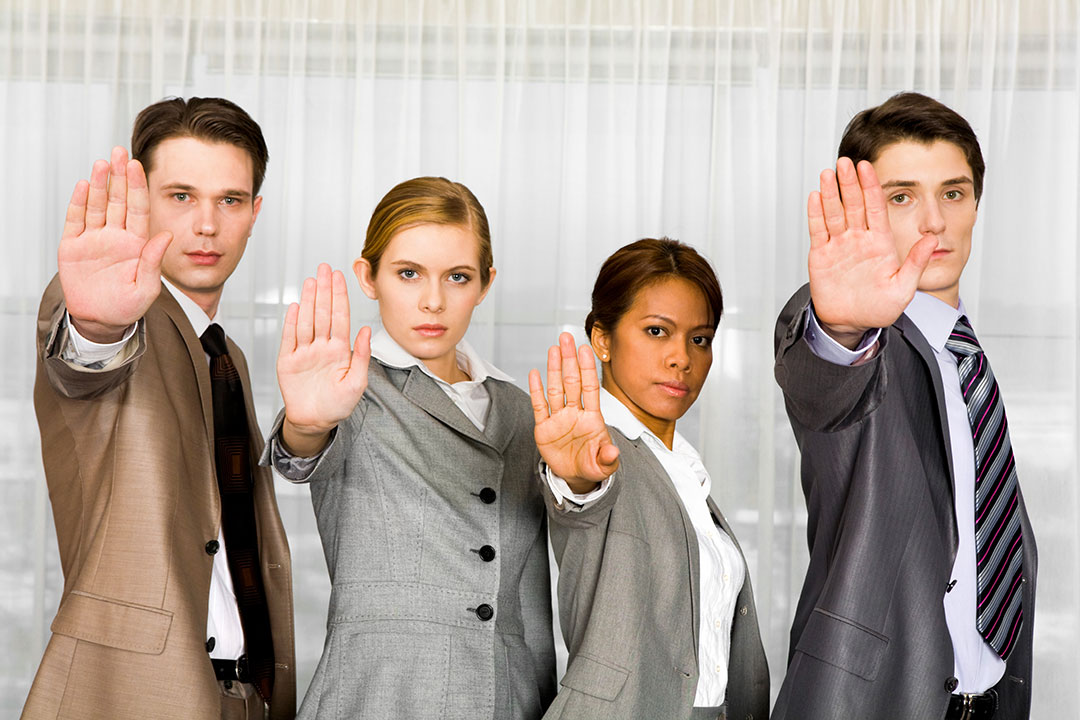 lawyers holding up hand